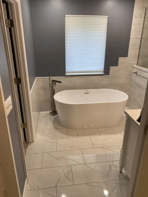 Bathroom with a white freestanding bathtub, Mason, OH
