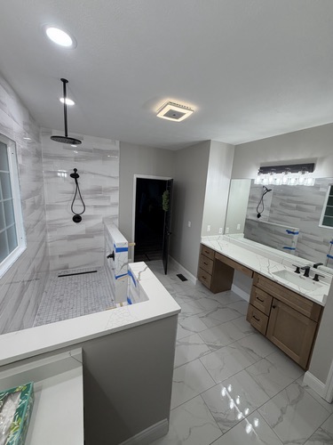 Master bathroom remodel with open walk-in shower and double vanity