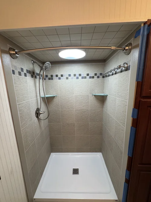 Empty shower with beige tile walls, Springboro, OH