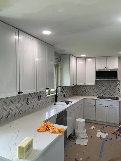 Kitchen under construction with white cabinets, Ross, OH