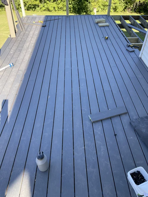 Dark gray wooden deck outdoors under construction, Oxford, OH