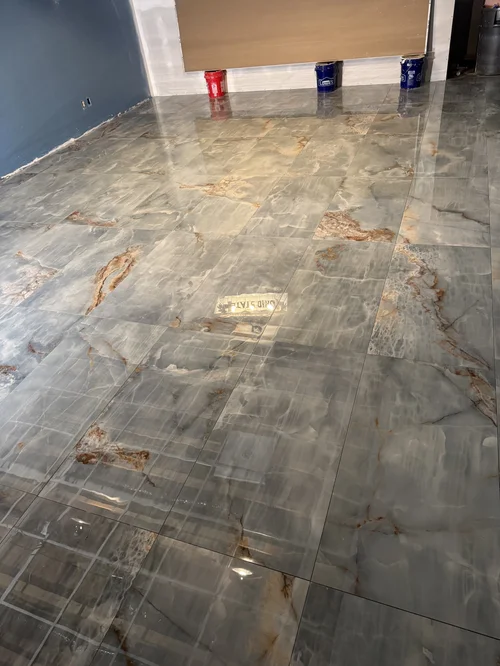Large-format marble-look tile floor installation, West Alexandria, OH