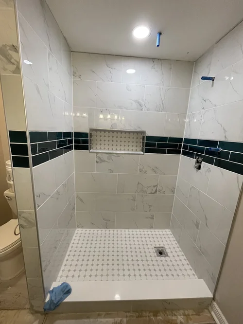 Walk-in shower with white marble tiles, Springboro, OH