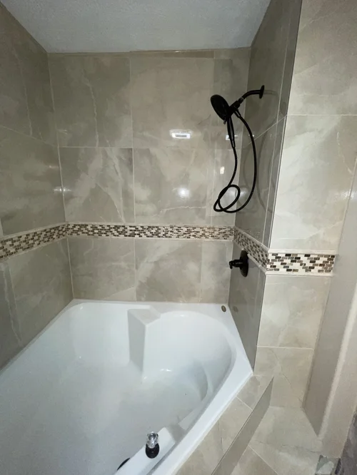 Bathroom shower with a built-in bathtub