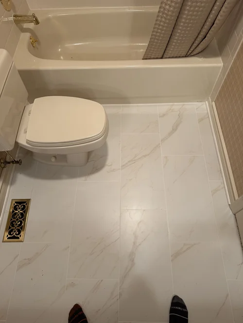 Bathroom with white marble tiles
