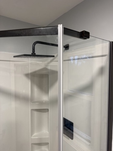 Corner shower with matte black rainfall head, Brookville, OH