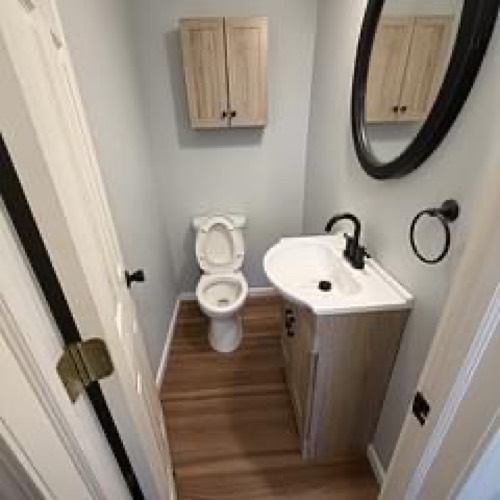 Half bath with new flooring, vanity and black hardware, Beavercreek, OH