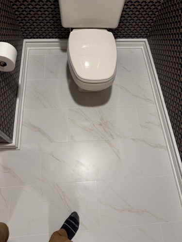 Bathroom floor remodel with large-format marble-look tile, Bellbrook, OH