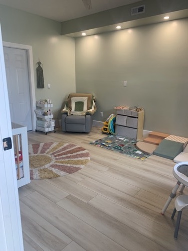 Room addition with wood-look flooring and fresh paint, West Alexandria, OH